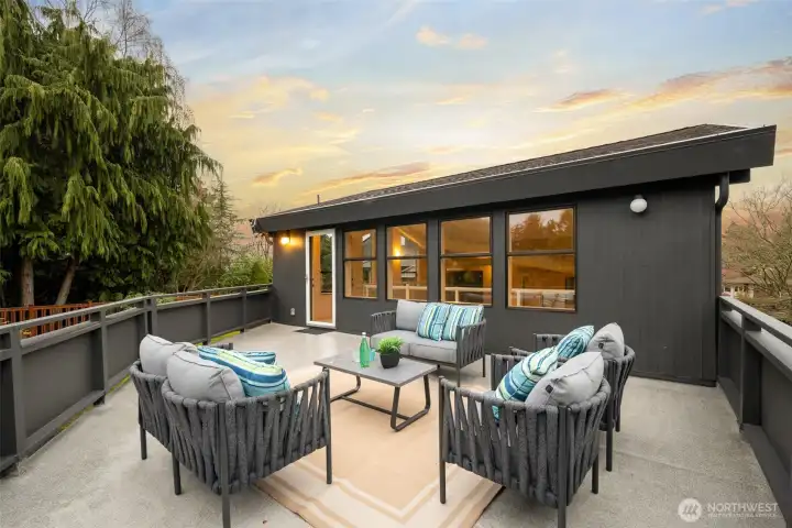 This huge back deck is just off the pool room!  Enjoy barbecues in the summer in your private oasis.