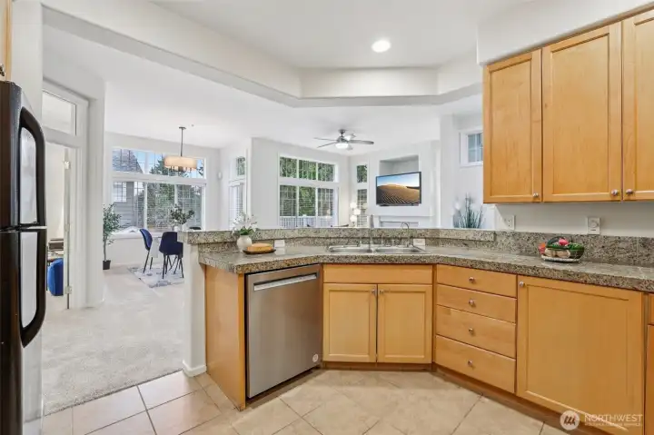 Kitchen is connected to living spaces for easy conversation