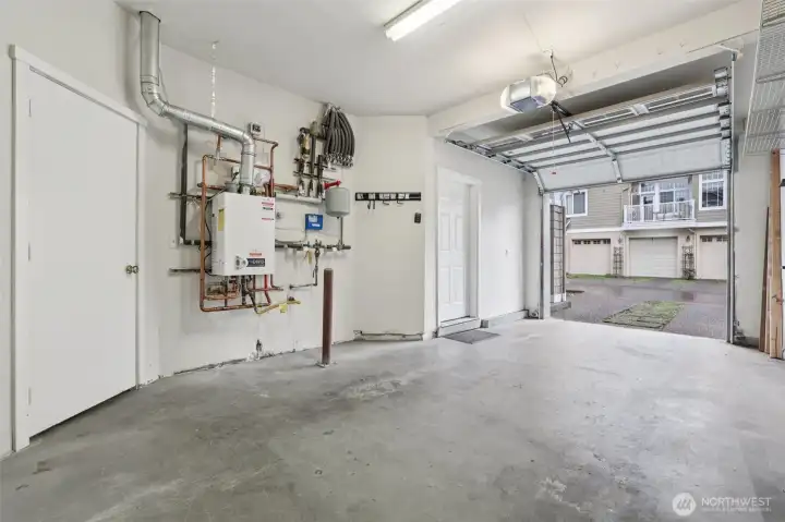 Large garage completely painted and ready for your vehicle!  EV Charger too.