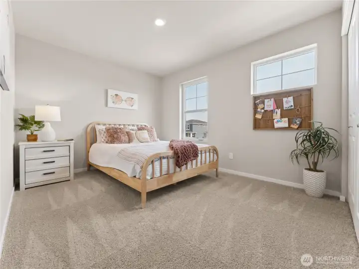 Secondary bedroom.  Photos are representative