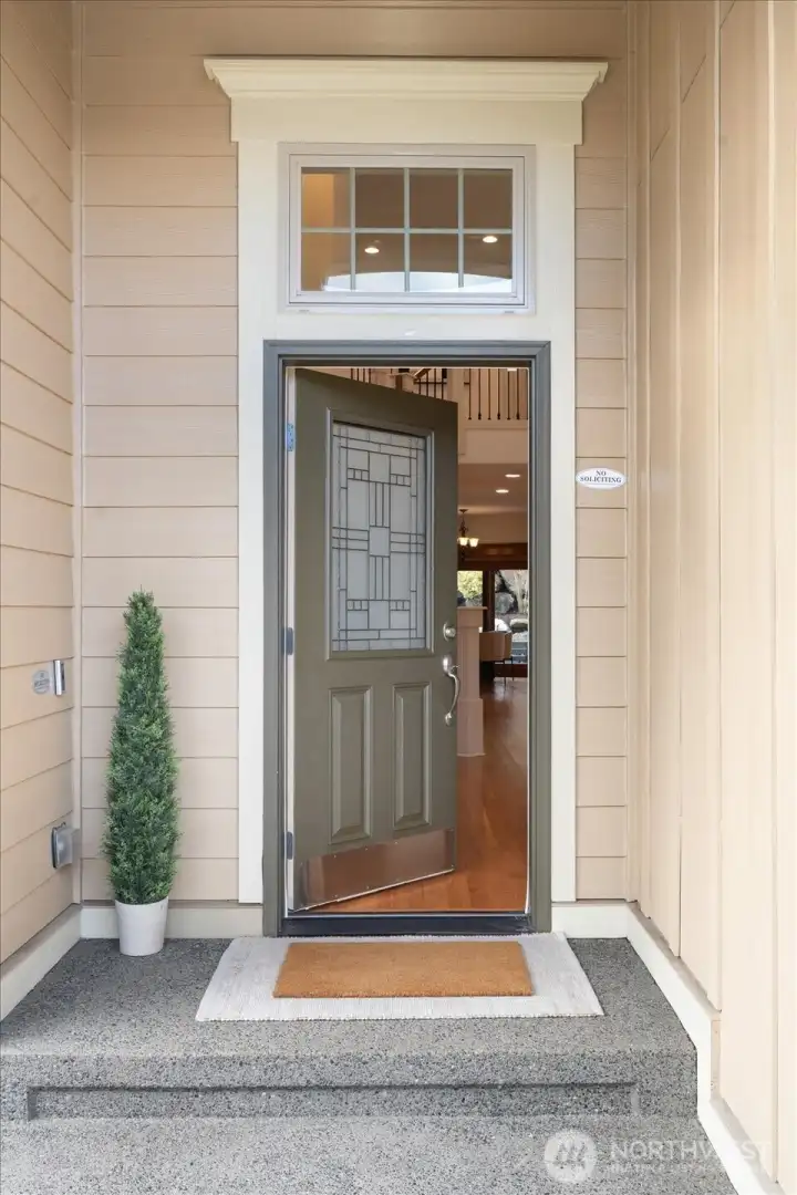 Gorgeous landscaped entry and a front door that has classical and sophisticated appeal.