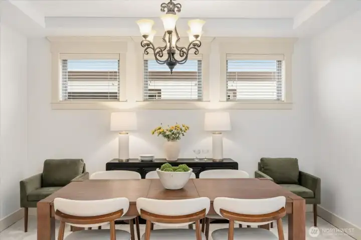 Another shot of the formal dining room showcasing a trio of gorgeous windows to let in lots of natural light