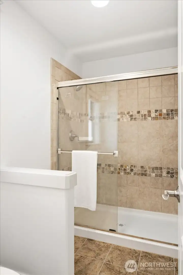 Beautiful tiling throughout the primary en-suite!