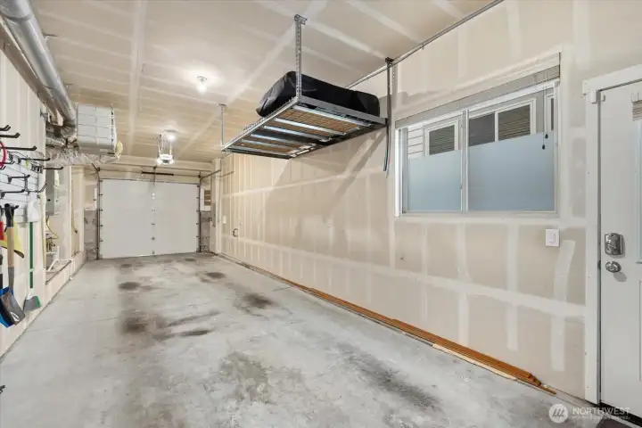 Upgraded HVAC system: equipped with A/C, HEPA-Air filter, & AirScape Whole House Fan. Generously-sized 2-car garage: added space, overhead storage, built-in wall organizers too!