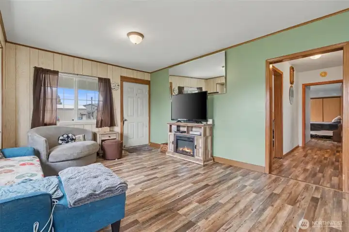 Living room - entry door and access to bedrooms