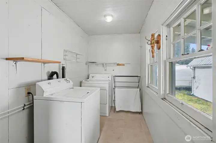 Laundry room opposite back entryway