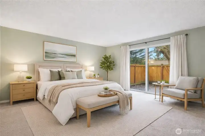 Primary Bedroom with private patio/yard