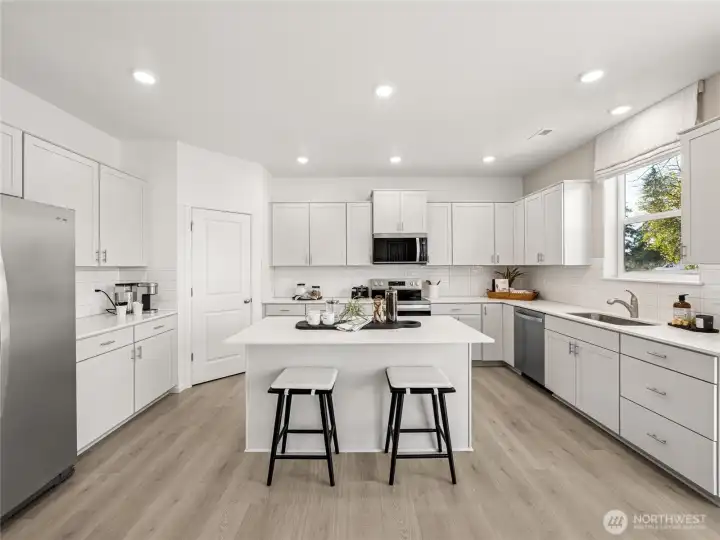 Quartz countertops included. Pictures are for representational purposes only, colors and features may vary.