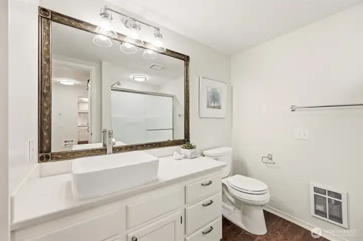 Updated bath with quartz vanity & vessel sink