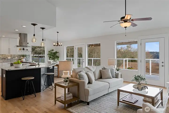 Just beautiful how the living room, dining room & kitchen flow seamlessly...