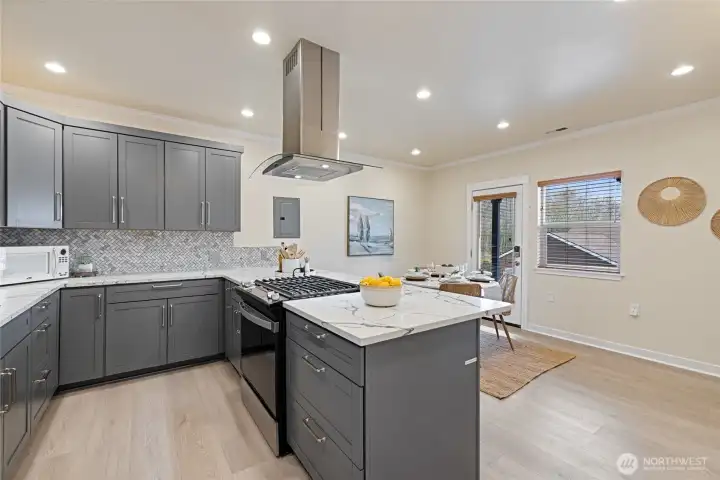 The door straight ahead to the right is access to covered parking and a covered patio.