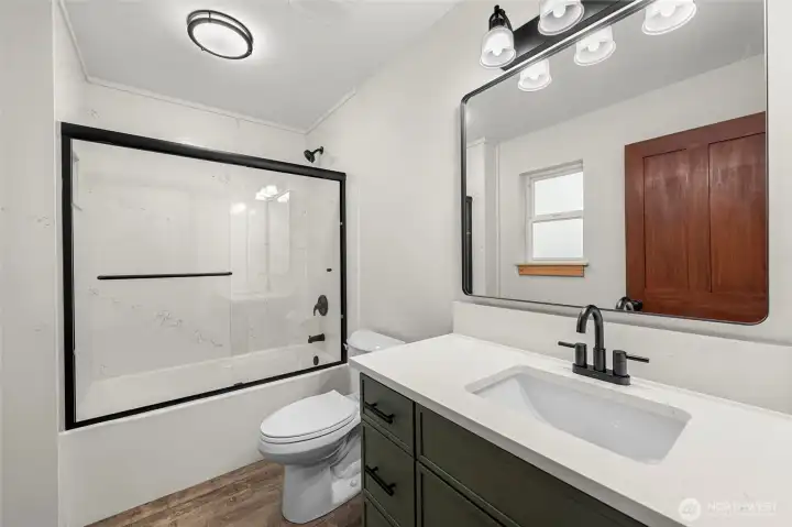 Main Level Full Bath - Quartz bath surround!