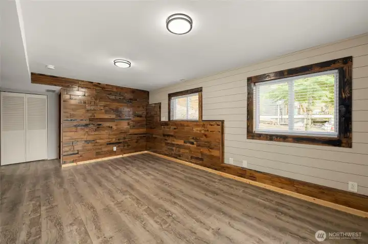 Downstairs Family/Media Room - Murphy bed on wood wall would be a great fit.