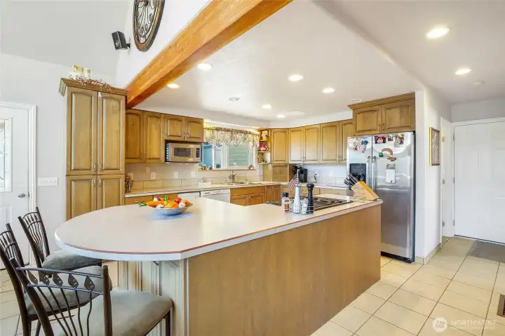 Well-designed kitchen with functional layout, ample cabinetry, and space for entertaining.