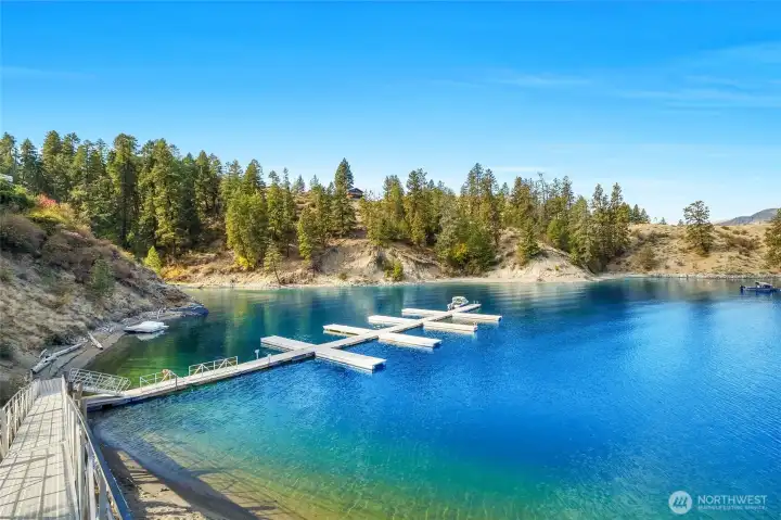 Community dock with assigned boat slip and guest moorage.
