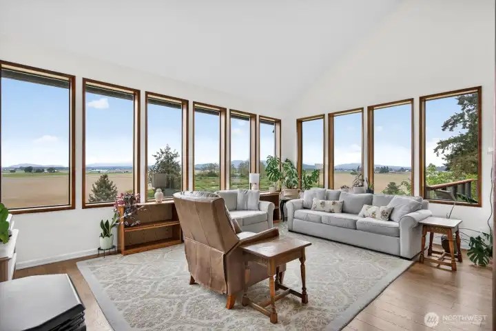 Spacious living with lots of natural light... Heat pump helps keep things cool in the summmer...