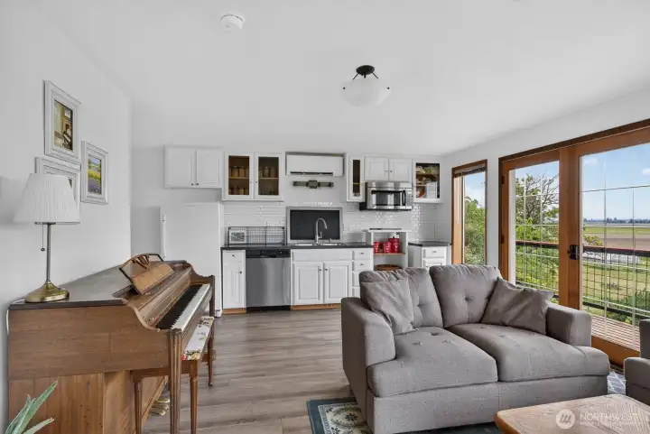Lower level of main home. Separate entrance with kitchenette, bath and laundry. Great for growing families, multi-generational living or additional rental income?