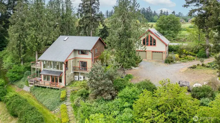 A rare mixture of the woods and farmland in the coveted Pleasent Ridge neighborhood...