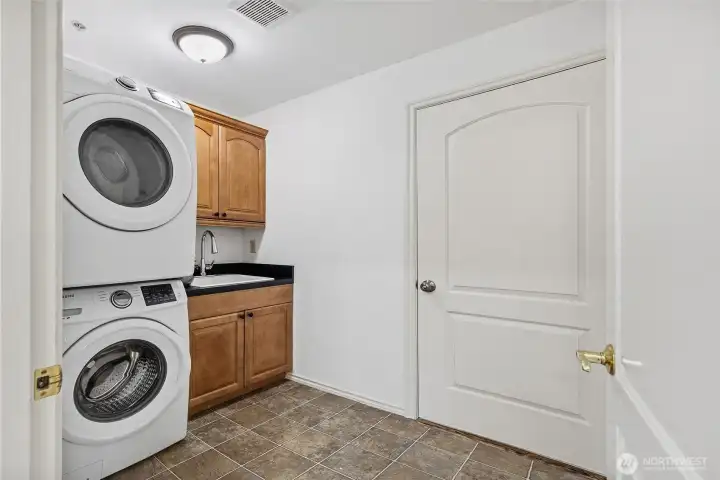 Laundry room off family room on main floor.
