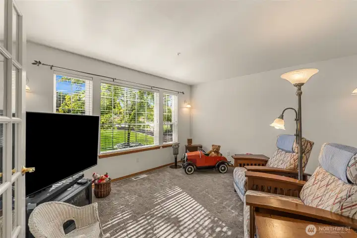 French doors to front living room.  Perfect for TV, music, hobbies or a quiet reading space.