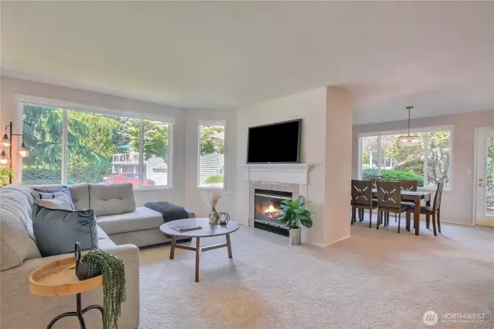 Cozy wood fireplace. Top-down blinds to take advantage of the tree/grass views.