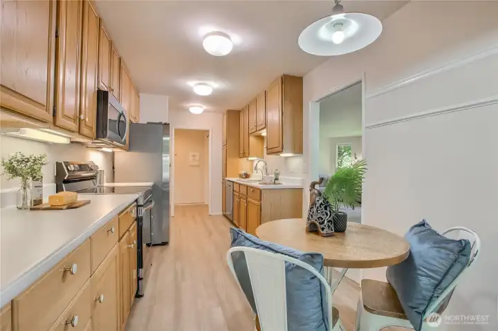 Kitchen flows easily to living/dining areas.
