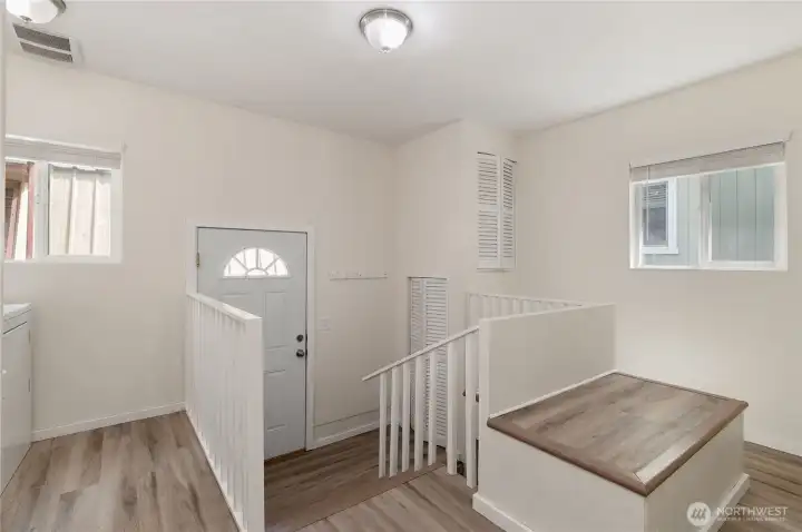 Back door / laundry / interior basement access areas.