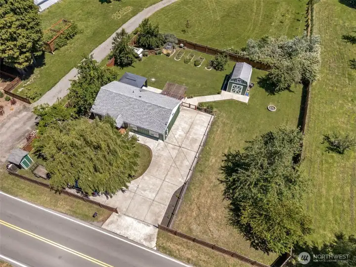 0.5 acre of fully-fenced & flat land!