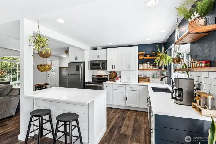 Eat-in Kitchen with Island and Garden Window + Dining Area