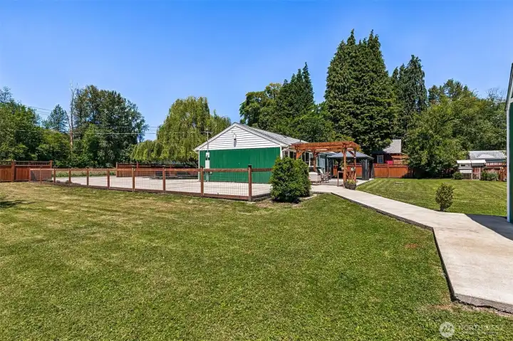 0.5 acre of fully-fenced & flat land!