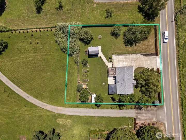 0.5 acre of fully-fenced & flat land!