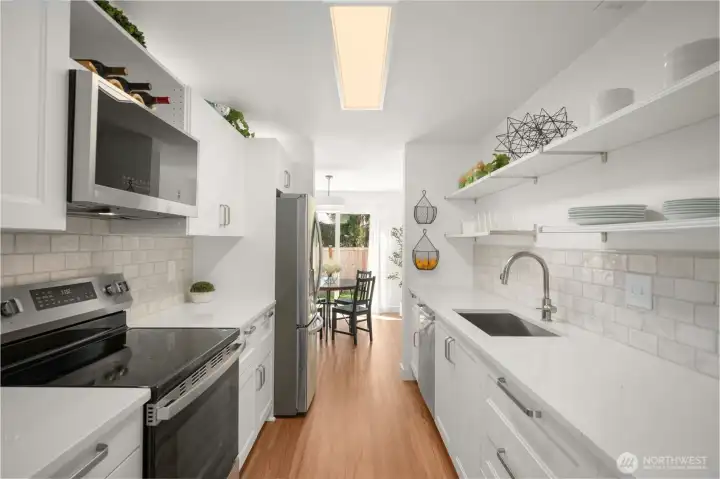Gorgeous Quartz Countertops & all appliances stay!