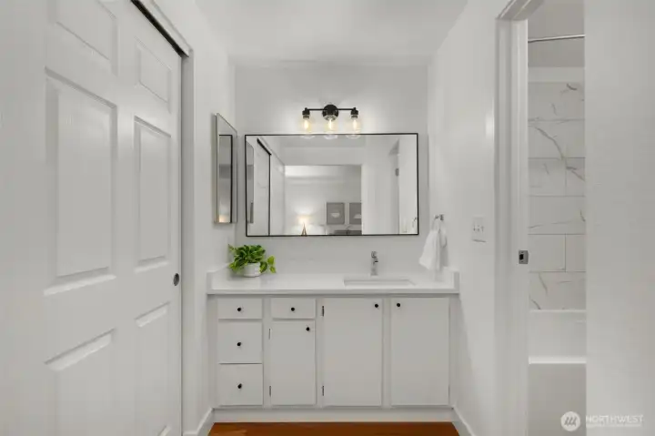 Primary vanity is outside shower for ease of getting ready!