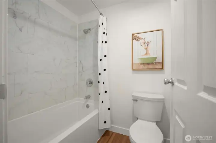 Full size upstairs hall bathroom.
