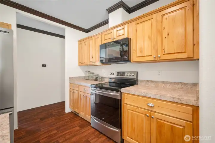 Stainless appliances in a fabulous kitchen layout.
