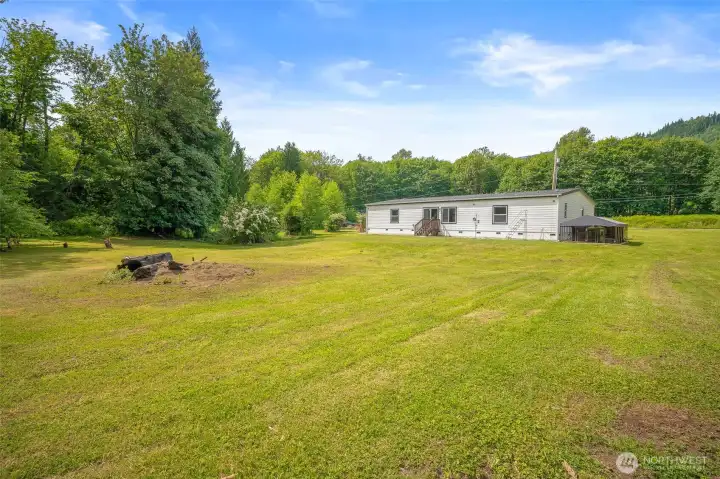 A view of the back of the home. Private and peaceful.