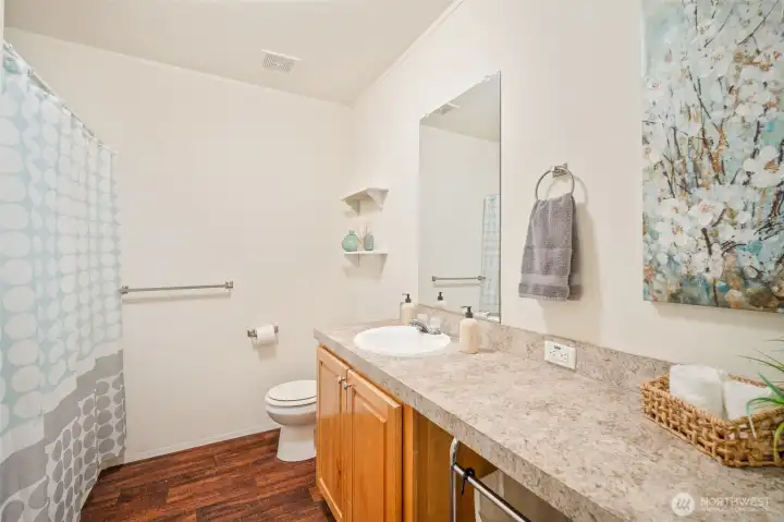 Down the hall and to the right full bathroom with ample counter space.