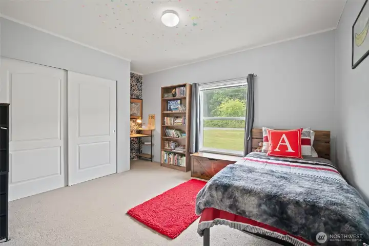 Across from the bathroom is bedroom 1.