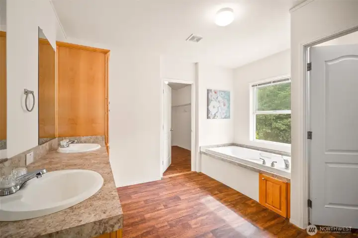 Primary ensuite with large garden soaker tub.