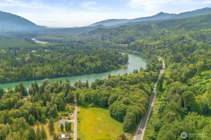 The home in the center of the photo is conveniently located off of Highway 20 and 2 minutes away from the grocery store.