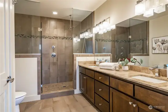 Elegant Main bath with walk-in, tile, granite beautiful cabinets