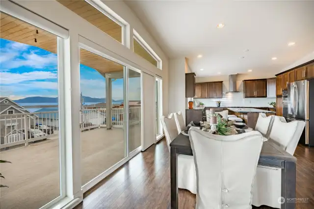 Huge main level 375 sq ft deck accessed from dining area, perfect for entertaining, soaking up the sun and the view.