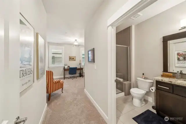 As you enter to Junior ensuite on main floor showcasing the private 3/4 bath.