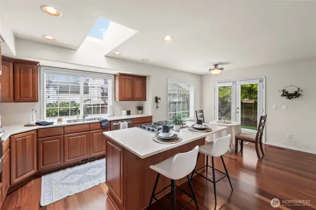 Kitchen with updated cabinets, tile and countertops