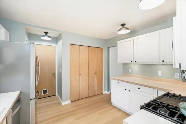 Washing machine and dryer are behind the bi-fold doors.