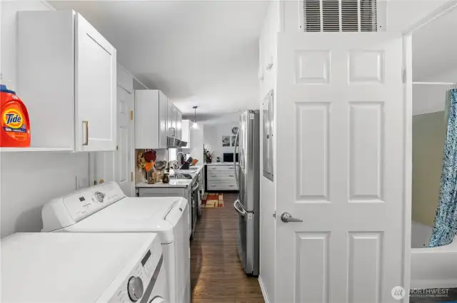 A great option to add space would be to replace the washer/dryer with a stackable apartment size set