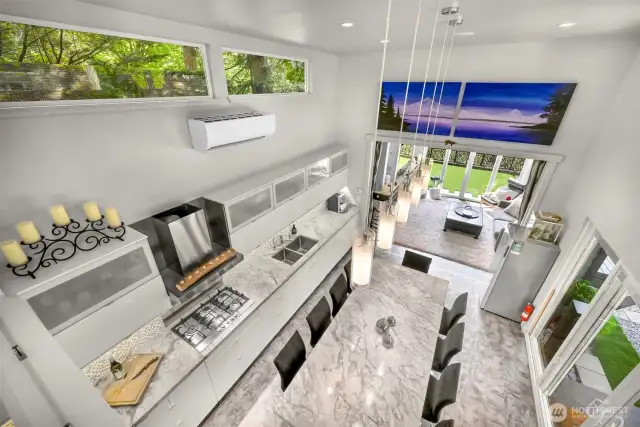 Looking at the kitchen and living room from the loft.