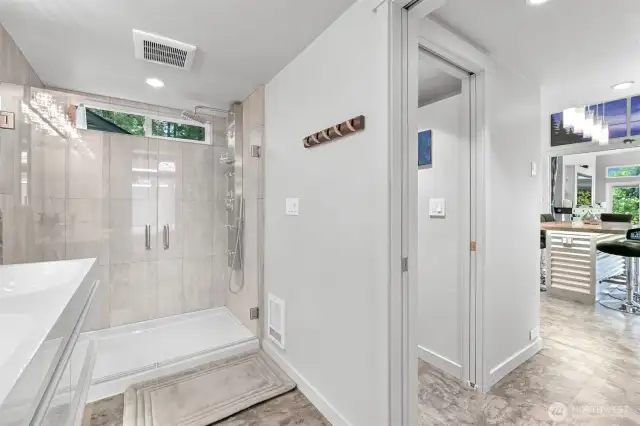 More of bathroom. Toilet located in the door to the right.