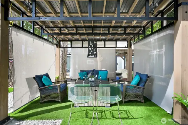 The fire pit shelter with Coolaroo blinds.