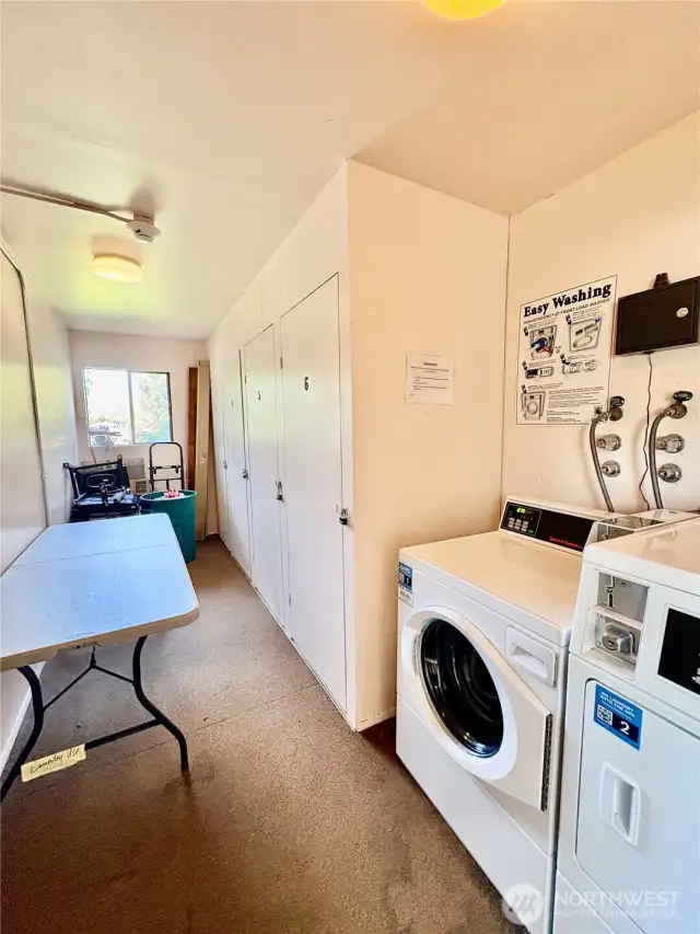 Nice bright laundry room serves this floor of apartments.